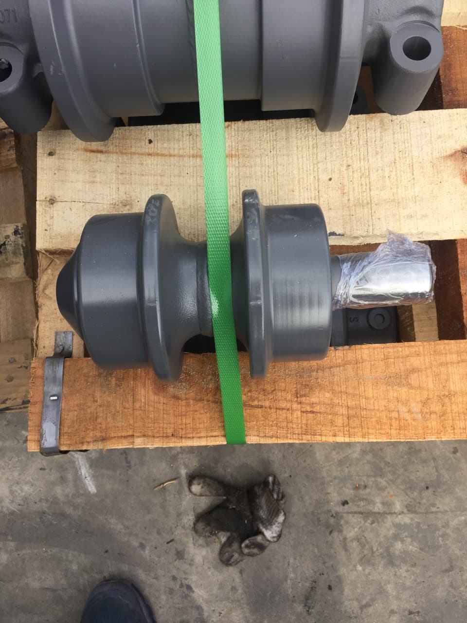 Excavator carrier roller detail view
