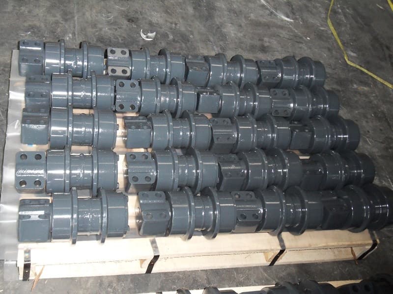 Standalone excavator carrier rollers arranged on a pallet