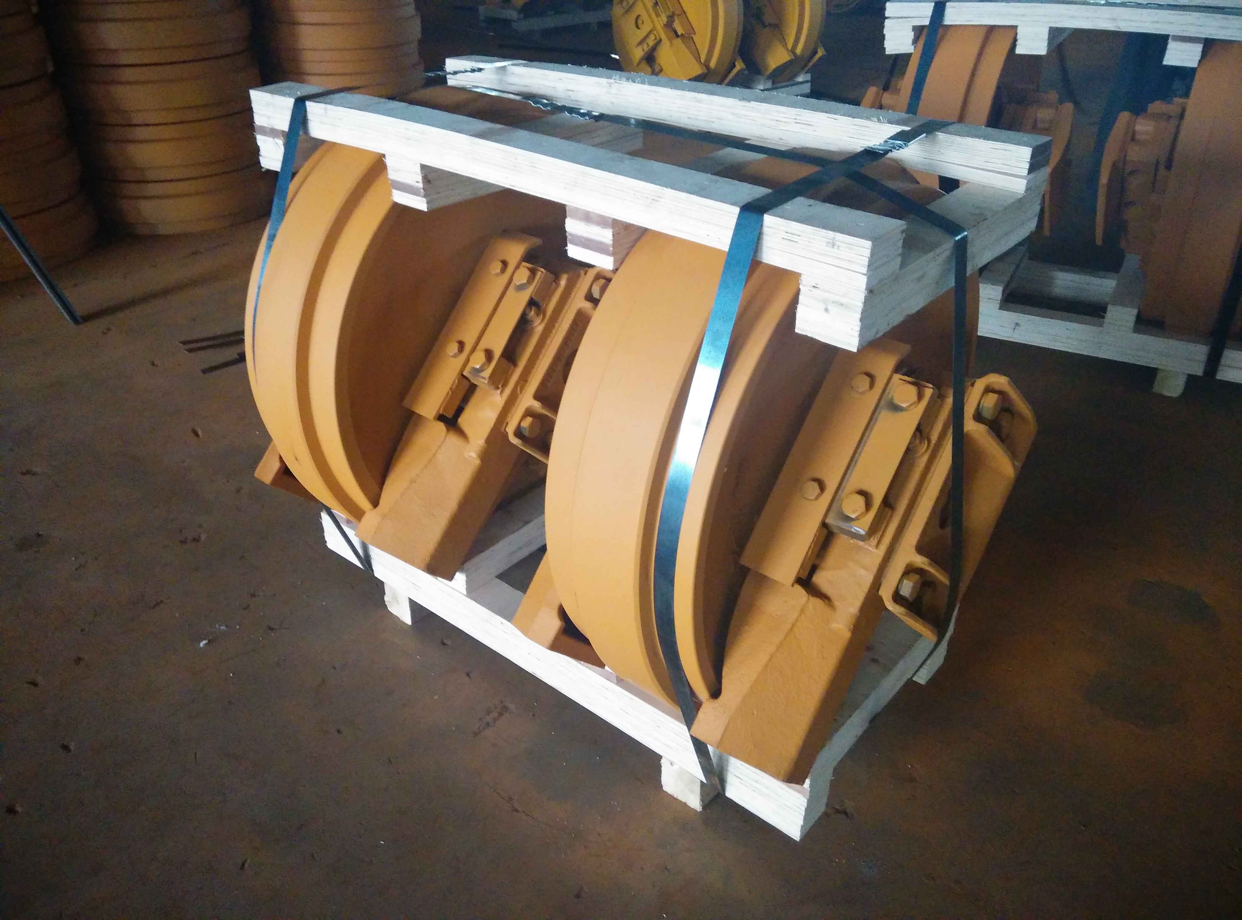 Bulldozer idler with yellow coating