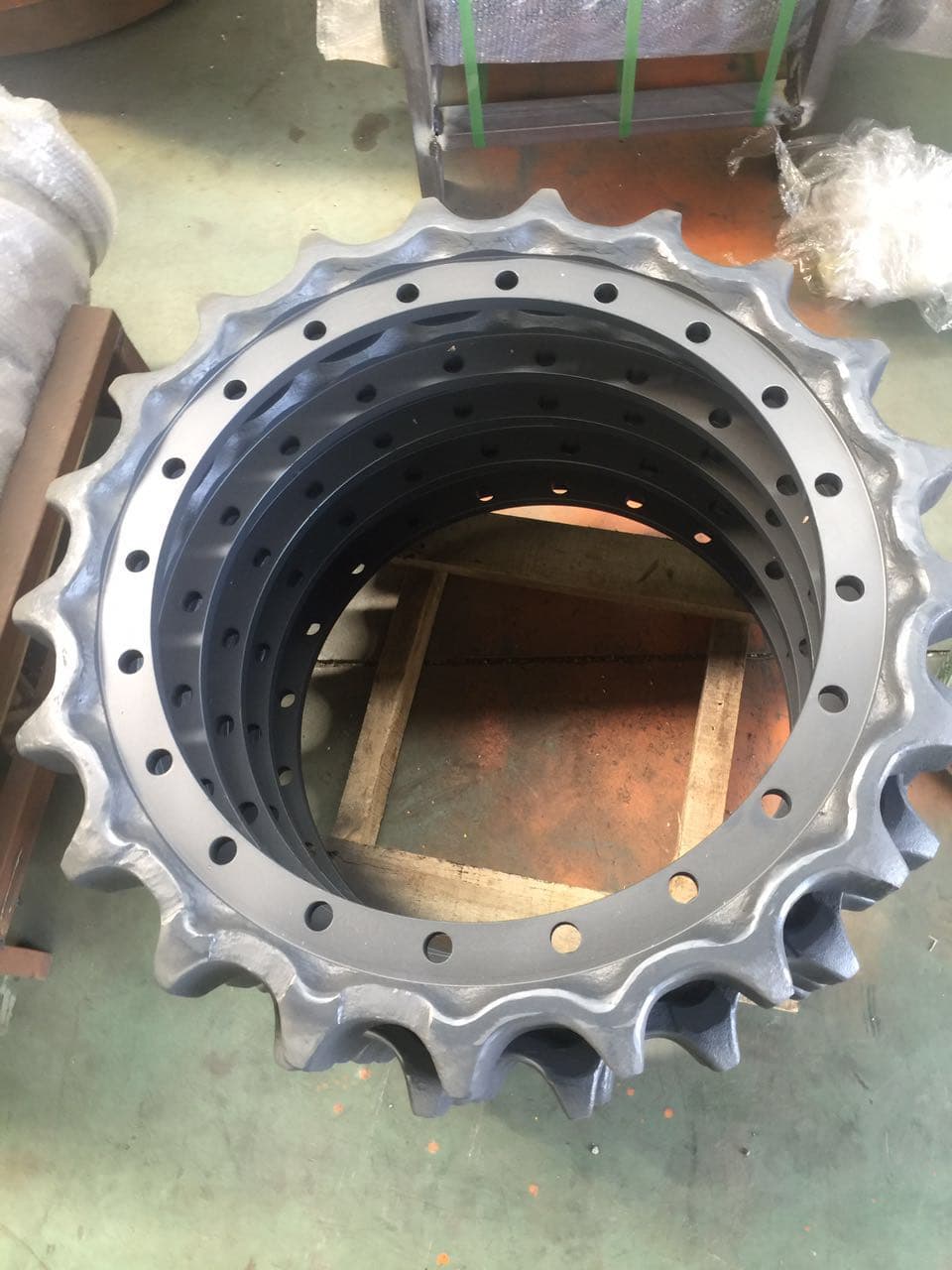 Nested excavator drive sprockets viewed from above