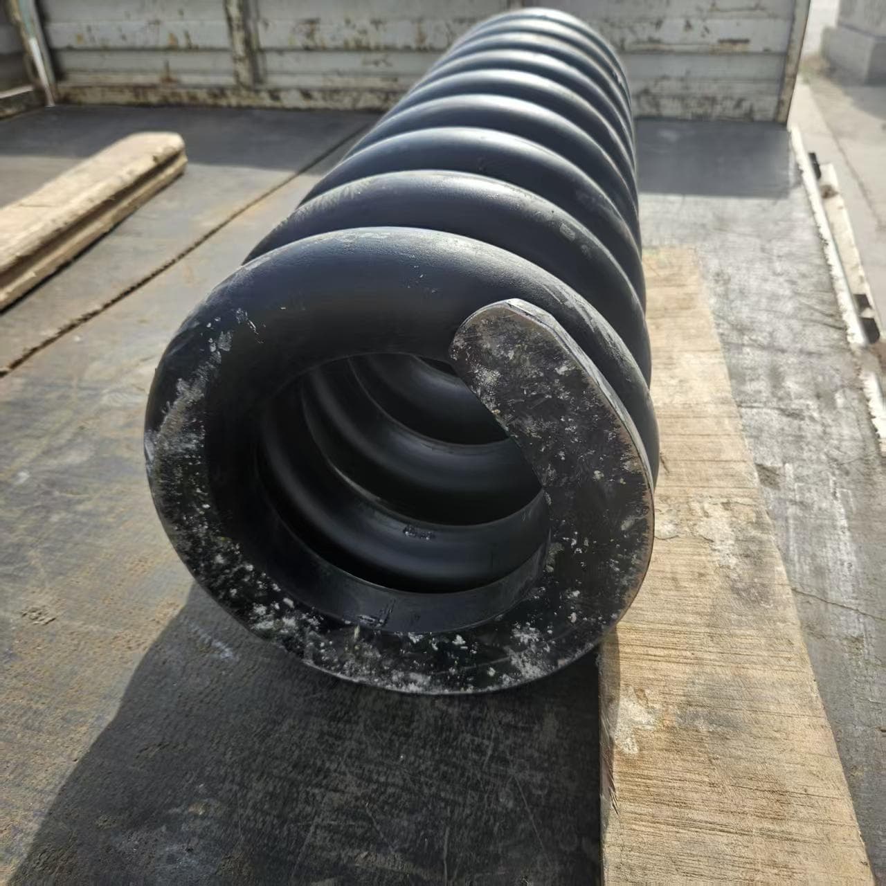 Track adjuster and recoil spring end detail