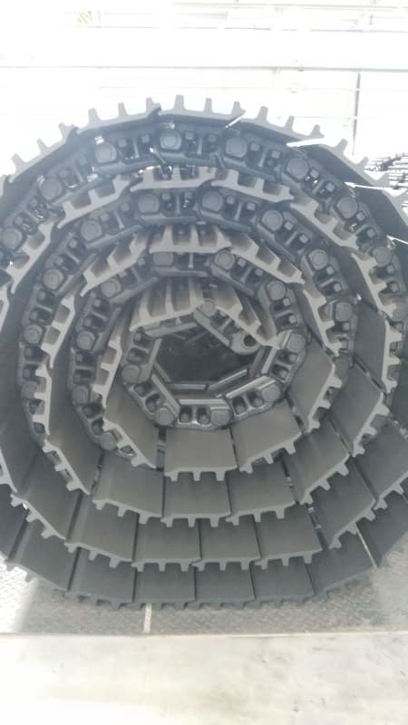 Excavator complete track group connection detail