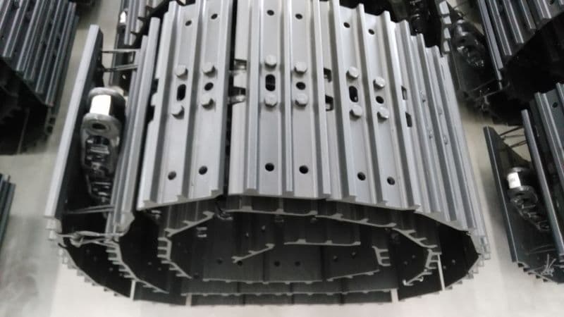 Excavator complete track group assembly view